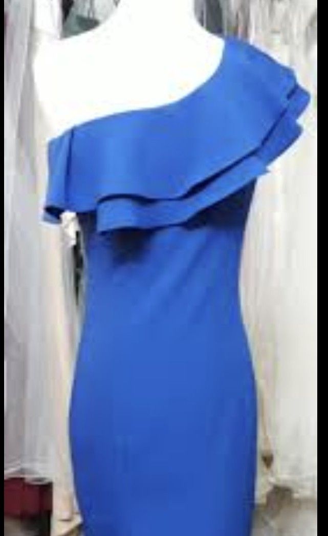 Blue One Shoulder Ruffle Dress (Category: Dresses) located in Cavite. Submitted by MLstore (Listing ID 1440516555, Image 1). Description: - Royal blue one-shoulder dress - Layered ruffle detail on bust and shoulder - Fitted silhouette - Side zipper closure - Ideal for parties and events - Chic and sophisticated look Fits M-L size.