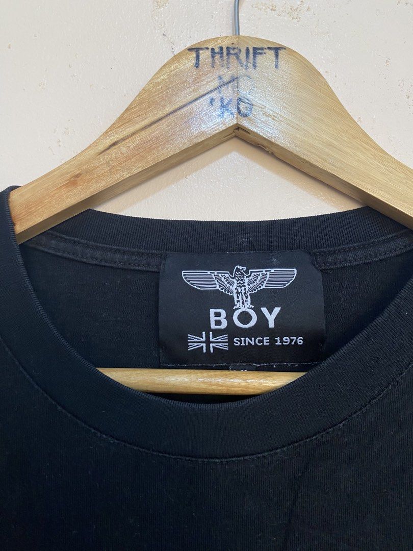 BOY London Black T-shirt Size Medium (Category: Tshirts & Polo Shirts ) located in Santiago. Submitted by mfdthriftstore (Listing ID 1440460063, Image 2). Description: - BOY London graphic t-shirt - Size: Medium - Measurements: 19.5 inches (width) x 27 inches (length) - Condition: Excellent, good as new - No issues or flaws found - Great statement graphic tee.