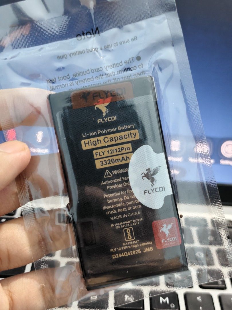 iPhone 12/12 Pro Battery (Category: Batteries & Power Banks) located in Taguig. Submitted by wiltech016 (Listing ID 1440404380, Image 2). Description: Selling a brand new, sealed FLYCDI replacement battery for the Apple iPhone 12 and iPhone 12 Pro. This is a "High Capacity" Li-ion polymer battery boasting 3320mAh. Since the original stock battery for these models is only 2815mAh, this upgrade will significantly improve your screen-on time and kee