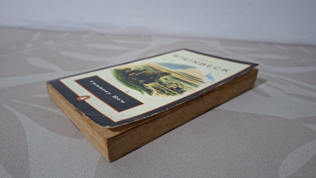 Cannery Row by John Steinbeck, Penguin Books (Category: Storybooks) located in Imus. Submitted by pick_and_dig (Listing ID 1440514199, Image 3). Description: - Classic novel: Cannery Row by John Steinbeck - Edition: Penguin Books - Condition: Pages yellowed with age, showing it's been read and enjoyed - Cover art: Intact - Great for book collectors and fans of timeless stories Note: As is. WYSIWYG. Additional photos available upon request. Mode o