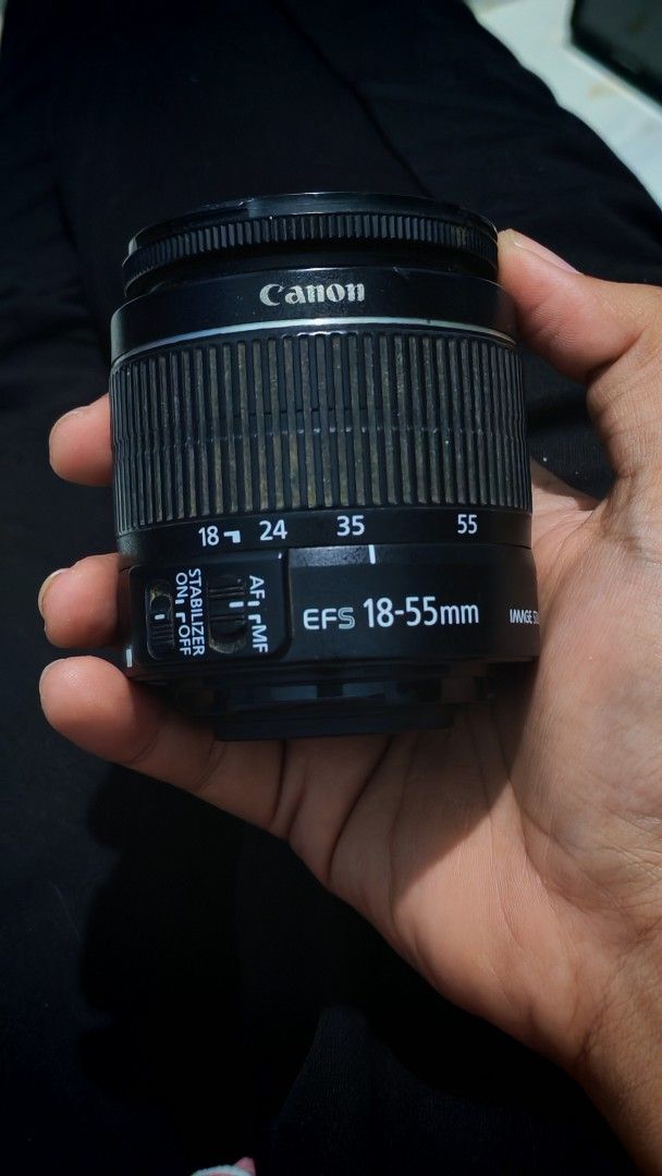 Canon 18-55mm IS II Lens (Issue: Fungus) (Category: Lens & Kits) located in Akbar. Submitted by anyastough (Listing ID 1440484571, Image 1). Description: Unit: Canon EF-S 18-55mm f/3.5-5.6 IS II ​Issue: Front element has prominent internal fungal growth/haze. Needs professional cleaning to restore optimal clarity. ​Status: Autofocus and image stabilization switches are completely functional. Smooth zoom ring. ​Selling cheap, strictly as-is for pa