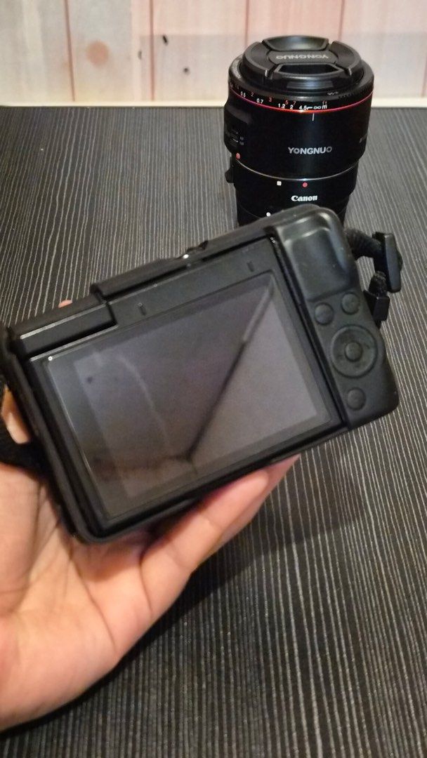 Canon M200 with 50MM lens (Category: Cameras) located in Antipolo. Submitted by stephp133 (Listing ID 1440423525, Image 2). Description: Canon M200 with 50MM lens known as the G7X dupe but better bc interchangeable yung lens included in the package - Canon M200 with kit lens 15-45MM (case and screen protector already attached) - Yongnuo 50MM lens with Canon EOS-M mount adapter - Canon tripod with remote - 2 batteries - 64GB memory card - Charger 