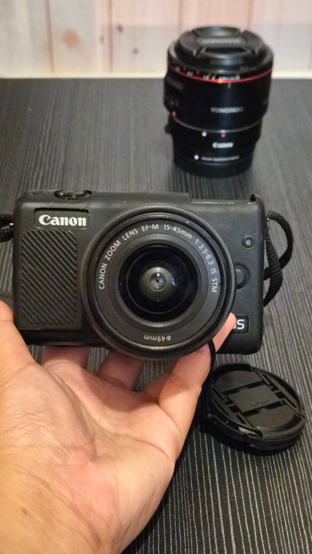 Canon M200 with 50MM lens (Category: Cameras) located in Antipolo. Submitted by stephp133 (Listing ID 1440423525, Image 1). Description: Canon M200 with 50MM lens known as the G7X dupe but better bc interchangeable yung lens included in the package - Canon M200 with kit lens 15-45MM (case and screen protector already attached) - Yongnuo 50MM lens with Canon EOS-M mount adapter - Canon tripod with remote - 2 batteries - 64GB memory card - Charger 