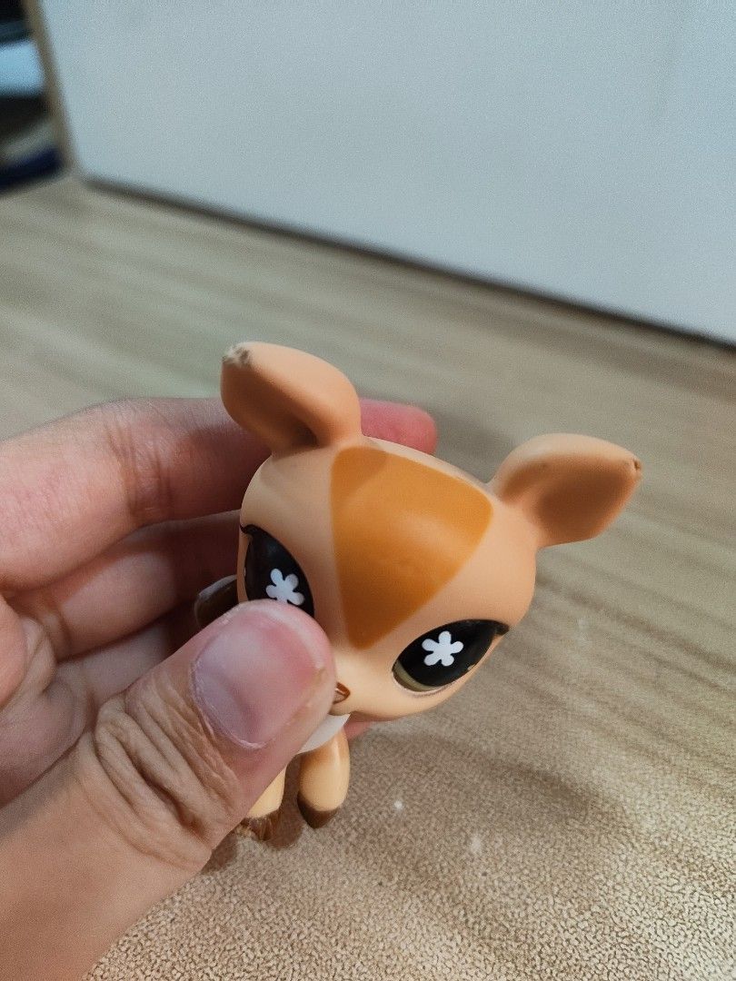 Canvassing Trade Offers for LPS Deer #634 (Category: Figurines & Statues) located in Manila. Submitted by kateulinaa (Listing ID 1440476331, Image 3). Description: checking trade offers! not sure if i'm going to trade her off yet hehe, last two slides are my isos note the condition: ear chips and hoof chip, as shown in the last three slides; and paint chips on the nose and tail.