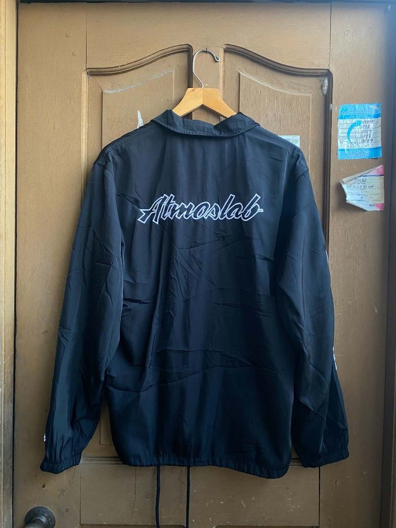 Champion x AtmosLab exclusive coach jacket black (Category: Coats, Jackets and Outerwear) located in Cabuyao City. Submitted by PHdowner30 (Listing ID 1440389303, Image 2). Description: FOR SALE ONLY Champion x AtmosLab exclusive coach jacket black size: L ( 21x26 ) excellent condition P300 + SF negotiable pm.
