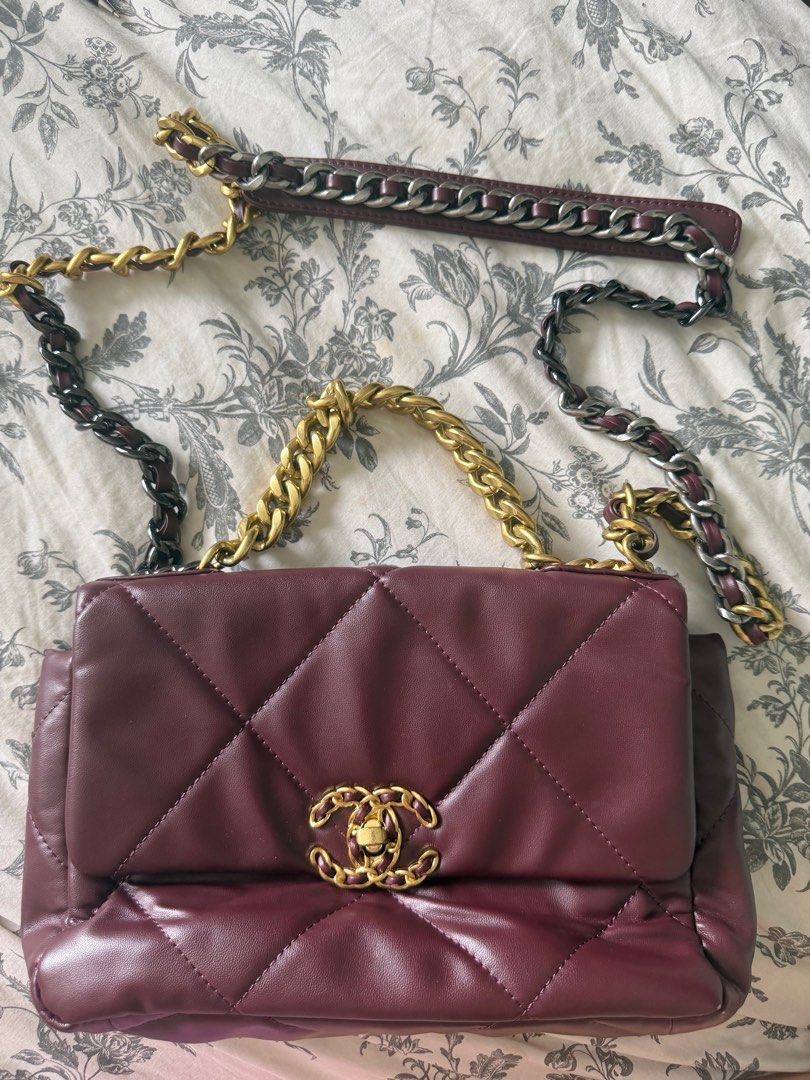 Chanel 19 Bag Burgundy Leather (Category: Luxury Bags & Wallets) located in Pasig City. Submitted by riccimoi (Listing ID 1440415904, Image 1). Description: - Authentic Burgundy Leather Chanel 19 Bag - Iconic CC Logo Detail - Stylish Mixed Metal Chain Strap - Luxurious Red Fabric Interior - Convenient Interior Zip Pocket - Spacious Design for Everyday Essentials - Perfect for Both Daily Use and Special Events.