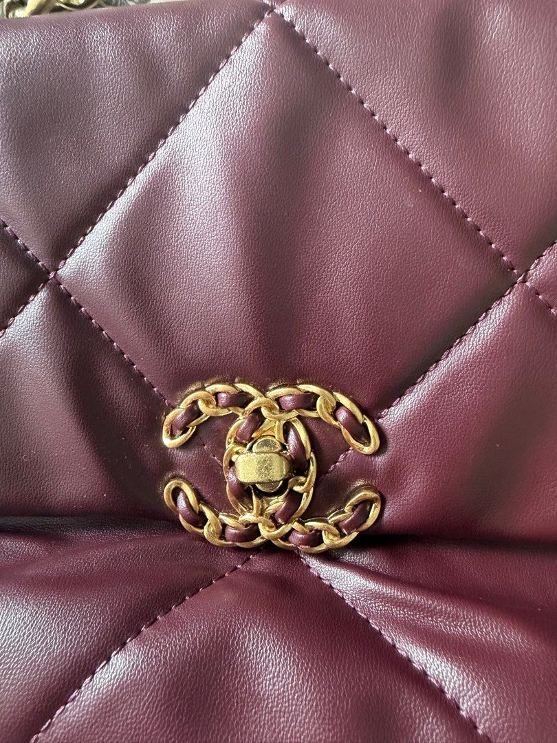 Chanel 19 Bag Burgundy Leather (Category: Luxury Bags & Wallets) located in Pasig City. Submitted by riccimoi (Listing ID 1440415904, Image 2). Description: - Authentic Burgundy Leather Chanel 19 Bag - Iconic CC Logo Detail - Stylish Mixed Metal Chain Strap - Luxurious Red Fabric Interior - Convenient Interior Zip Pocket - Spacious Design for Everyday Essentials - Perfect for Both Daily Use and Special Events.