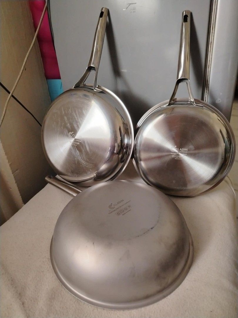 Cladin titanium clad premium cookware (Category: Cookware & Accessories) located in Baguio. Submitted by noona_faith (Listing ID 1440513428, Image 3). Description: This is a bundle deal. Take all 3 pans (24cm frypan, 28cm frypan, and 28cm wok pan). PLUS a freebie of stainless divider/organizer ‼️ One bundle available only . This is full clad pans with titanium coating which means nonstick with higher scratch resistance and is lighter in weight th