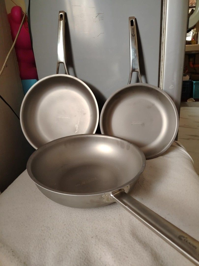 Cladin titanium clad premium cookware (Category: Cookware & Accessories) located in Baguio. Submitted by noona_faith (Listing ID 1440513428, Image 2). Description: This is a bundle deal. Take all 3 pans (24cm frypan, 28cm frypan, and 28cm wok pan). PLUS a freebie of stainless divider/organizer ‼️ One bundle available only . This is full clad pans with titanium coating which means nonstick with higher scratch resistance and is lighter in weight th