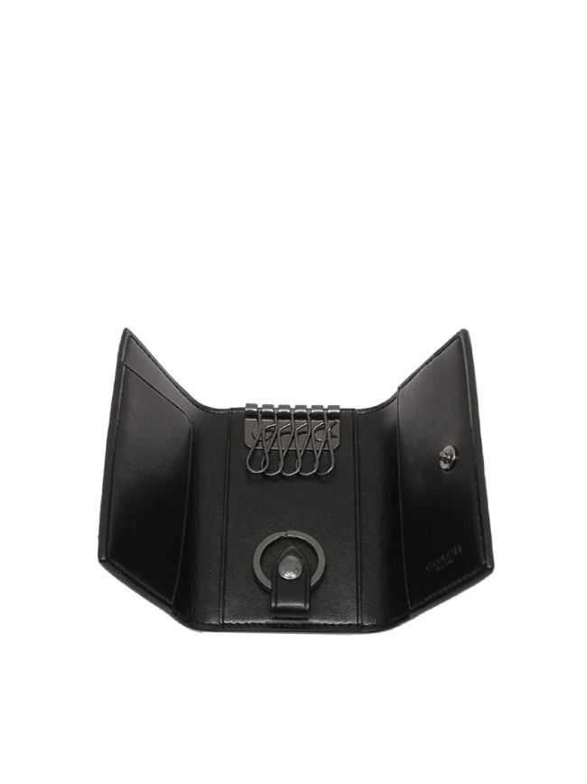 Coach Tan Five Key Ring Signature (Category: Luxury Accessories) located in Manila. Submitted by mariasfabshop (Listing ID 1440467991, Image 3). Description: You may send us a message if you want another set of photos of the key ring holder. .