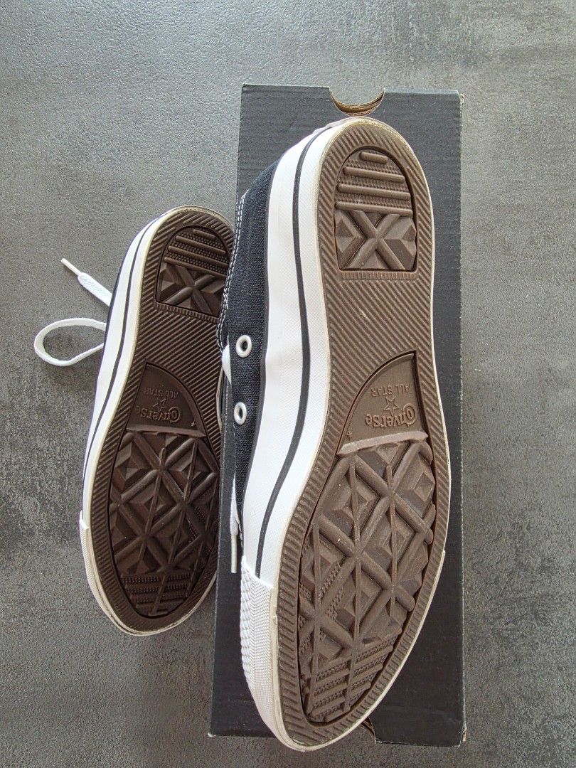 Converse All Star Ox Black Sneakers (Category: Sneakers) located in Paranaque City. Submitted by mark.ortigas (Listing ID 1440398648, Image 2). Description: - Classic black Converse low-tops - Durable canvas upper - White laces and signature toe cap - Sturdy rubber sole - Includes original box - Ideal for everyday style and comfort.