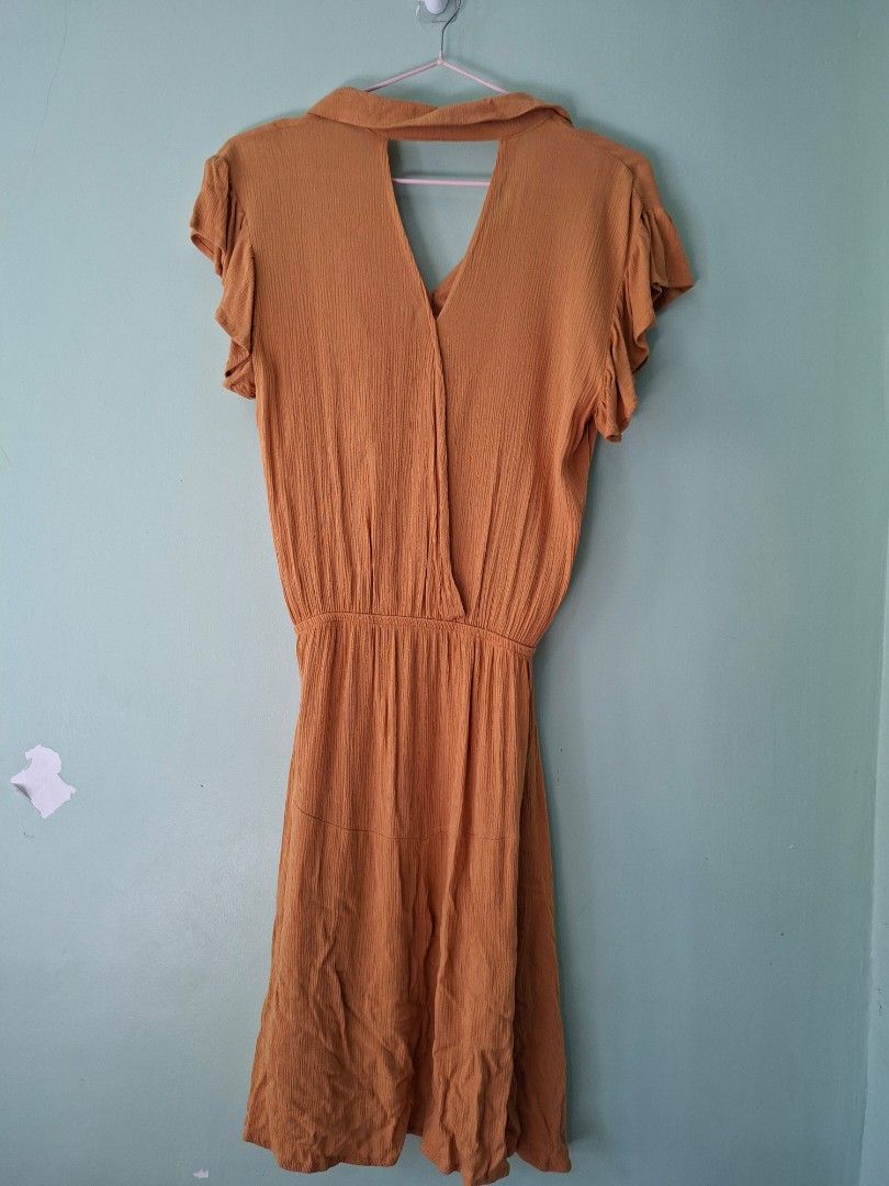 Cotton Yellow Mustard Dress (Category: Dresses) located in Las Pinas. Submitted by ronabelles (Listing ID 1440505656, Image 3). Description: Cotton On Mustard Dress soft flowy fabric with flutter sleeves garterized waistline fits S to M worn once, no flaw really pretty when worn .