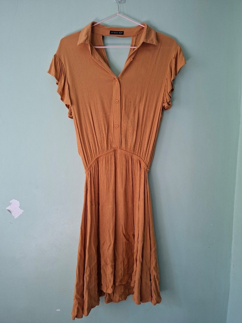 Cotton Yellow Mustard Dress (Category: Dresses) located in Las Pinas. Submitted by ronabelles (Listing ID 1440505656, Image 2). Description: Cotton On Mustard Dress soft flowy fabric with flutter sleeves garterized waistline fits S to M worn once, no flaw really pretty when worn .