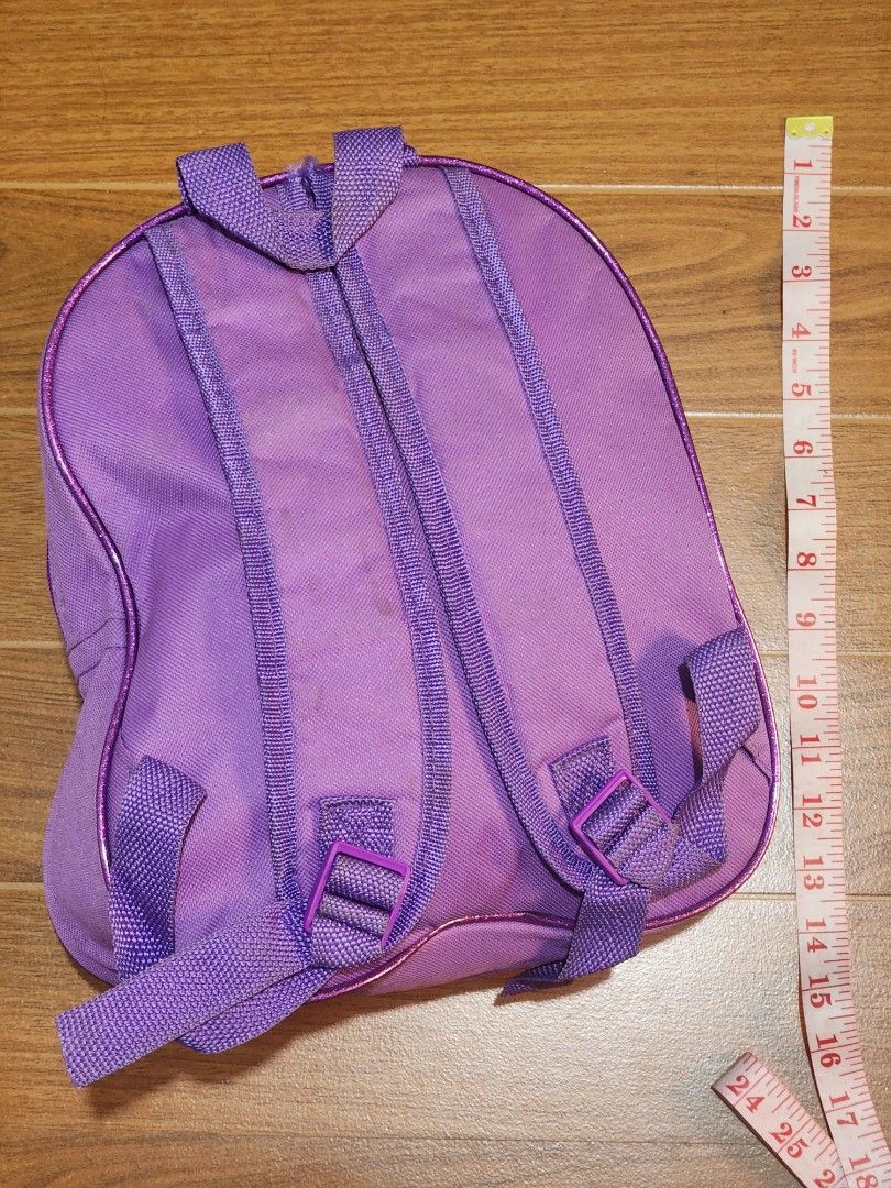 Disney Frozen Elsa & Anna Sequin Backpack Purple (Category: Babies & Kids Fashion) located in Meycauayan. Submitted by MP_Shop (Listing ID 1440491817, Image 3). Description: - Features beloved characters Elsa and Anna - Eye-catching reversible sequins that change color - Adjustable straps for a comfortable fit - Zipper closure for the main compartment - Ideal for school, travel, or everyday adventures - Approximately 10 inches tall.