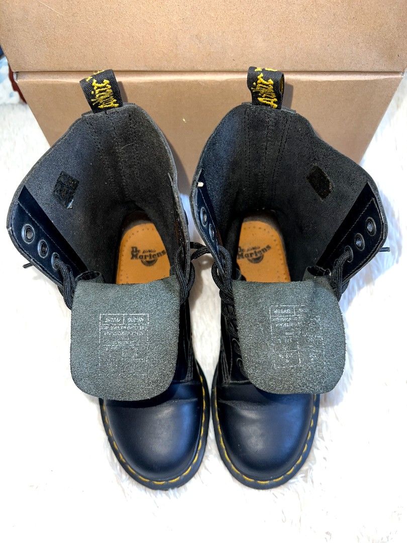 Dr. Martens Black Leather Lace-Up Boots (Category: Boots) located in Quezon City. Submitted by thrifterella (Listing ID 1440480371, Image 3). Description: Classic black leather Dr. Martens boots 🥾 Genuine Leather Color: Black w/ Iconic yellow stitching Size: 22.5 cm Conditions: preloved no box Selling Price: ₱2,500 (Slightly negotiable).