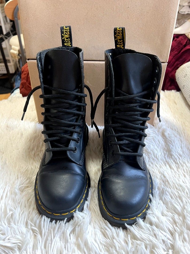 Dr. Martens Black Leather Lace-Up Boots (Category: Boots) located in Quezon City. Submitted by thrifterella (Listing ID 1440480371, Image 1). Description: Classic black leather Dr. Martens boots 🥾 Genuine Leather Color: Black w/ Iconic yellow stitching Size: 22.5 cm Conditions: preloved no box Selling Price: ₱2,500 (Slightly negotiable).