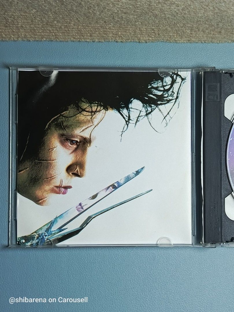 Edward Scissorhands VCD - Johnny Depp, Winona Ryder (Category: CDs & DVDs) located in Cebu City. Submitted by shibarena (Listing ID 1440475481, Image 3). Description: - Edward Scissorhands VCD (Pre-owned) - Starring Johnny Depp and Winona Ryder - Note: Both disc holders are broken. - From 20th Century Fox - A classic fantasy film ⚠️ Please ensure your DVD player supports VCD before purchase..