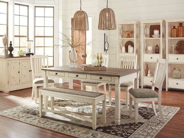 Farmhouse Dining Table, Chairs, and Bench Set (Category: Tables & Sets) located in Caloocan City. Submitted by bountycart (Listing ID 1440394587, Image 1). Description: - Farmhouse-style dining set - Includes: Wooden table (dark top, white base), 4 chairs with upholstered seats, 1 long bench - Rustic charm, fits various decor styles - Perfect for family meals and entertaining - Ready for a new home.