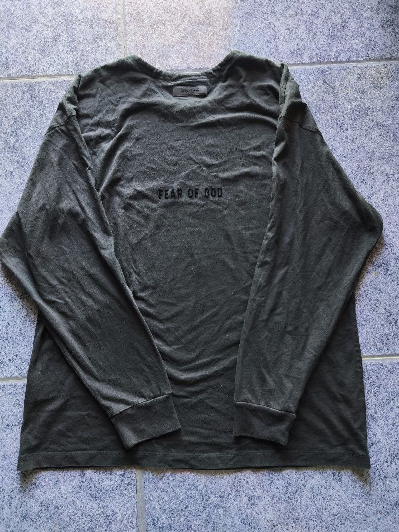 Fear of God Essentials Long Sleeve T-Shirt (Category: Tshirts & Polo Shirts ) located in Sogod. Submitted by engr.thrift.22 (Listing ID 1440386476, Image 2). Description: - Brand: Fear of God Essentials - Color: Grey - Style: Long Sleeve Tee - Features: Embroidered logo on chest and back - Neckline: Crew neck - Versatile: Great for layering or wearing solo.