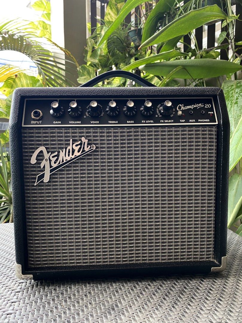 🔥Fender Champion 20 Guitar Amplifier | 💯Original (Category: Musical Instruments) located in Cebu City. Submitted by kantocloset_ubec (Listing ID 1440492940, Image 1). Description: - Fender Champion 20 Guitar Amplifier - Ideal for practice sessions and small gigs - Offers multiple amp voices and built-in effects - Includes controls for Input, Gain, Volume, Voice, Bass, Treble, FX Level, FX Select, Tap, Aux, and Phones - Fully functional and in g