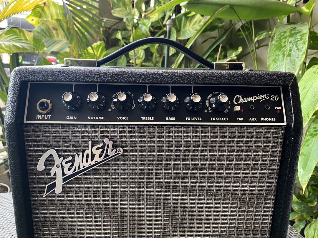 🔥Fender Champion 20 Guitar Amplifier | 💯Original (Category: Musical Instruments) located in Cebu City. Submitted by kantocloset_ubec (Listing ID 1440492940, Image 2). Description: - Fender Champion 20 Guitar Amplifier - Ideal for practice sessions and small gigs - Offers multiple amp voices and built-in effects - Includes controls for Input, Gain, Volume, Voice, Bass, Treble, FX Level, FX Select, Tap, Aux, and Phones - Fully functional and in g