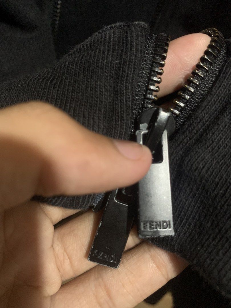 Fendi Black Bomber Jacket with Monster Eyes Logo (Category: Luxury Apparel) located in Manila. Submitted by haven_thrift (Listing ID 1440496408, Image 3). Description: - Black Fendi bomber jacket - Iconic monster eyes logo embroidered on chest - Full zip closure - Made in Italy - Ideal for Fendi enthusiasts.