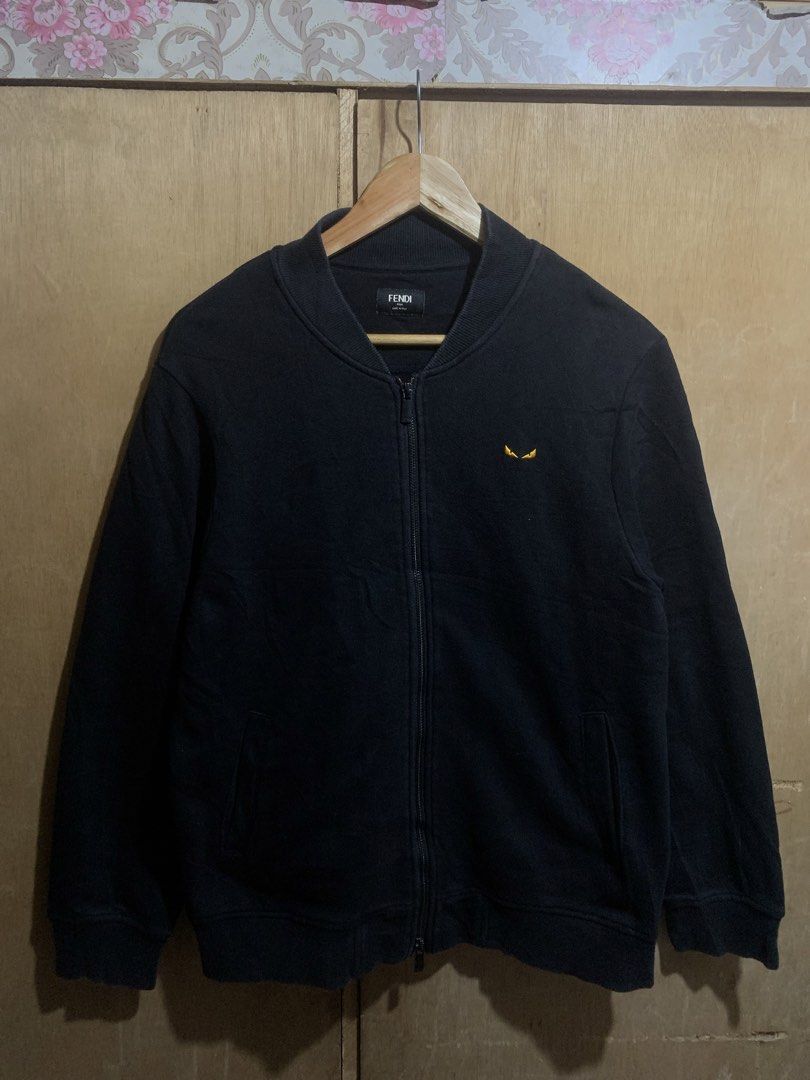 Fendi Black Bomber Jacket with Monster Eyes Logo (Category: Luxury Apparel) located in Manila. Submitted by haven_thrift (Listing ID 1440496408, Image 1). Description: - Black Fendi bomber jacket - Iconic monster eyes logo embroidered on chest - Full zip closure - Made in Italy - Ideal for Fendi enthusiasts.