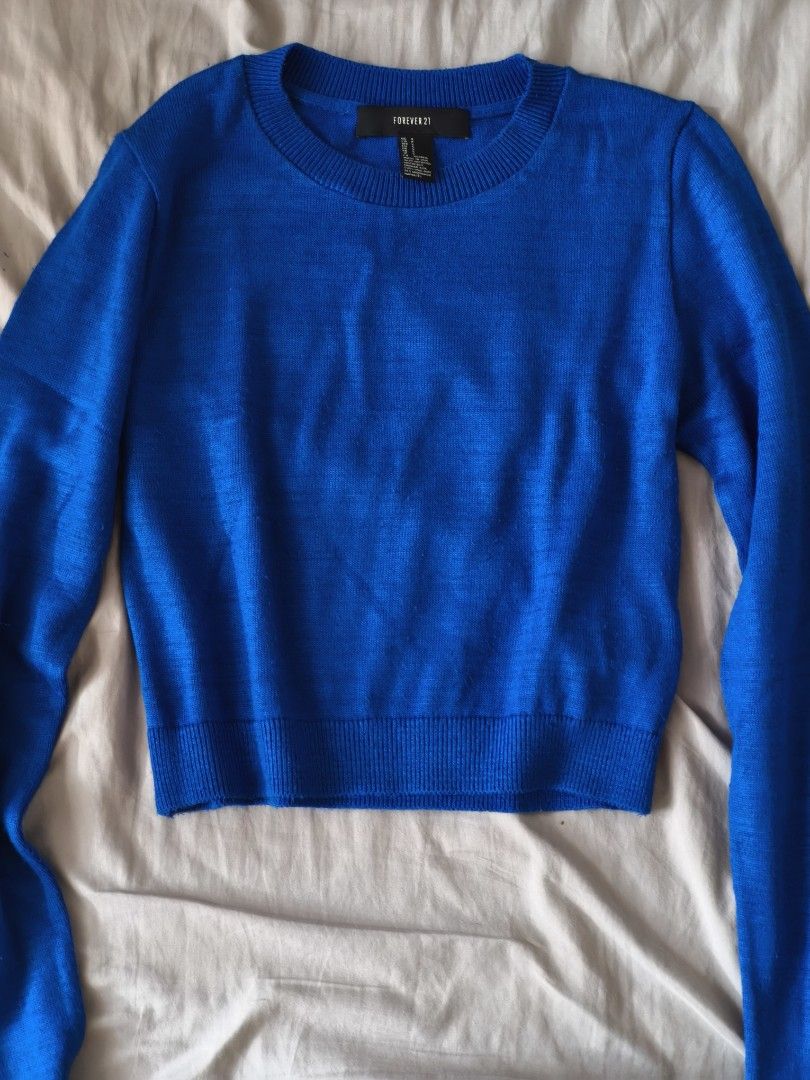 Forever 21 Knitted Croptop (Category: Longsleeves) located in Quezon City. Submitted by declutterwithnari (Listing ID 1440465338, Image 1). Description: Forever 21 Knitted Croptop: Blue - In fair condition, decent condition. - Size: Small (check pictures for references) mop: GCash, GoTyme, Maya (payment first) mod: Lalamove, Grab, J&T .