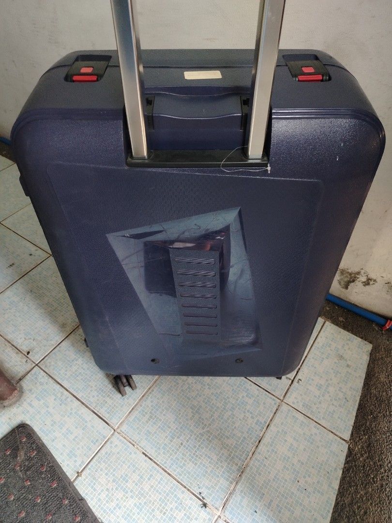 FORTPACK Dark Blue Lightweight Hardcase Luggage with Wheels (Category: Luggage) located in Manila. Submitted by billionaireaco (Listing ID 1440491687, Image 2). Description: - Dark blue hardcase luggage - Lightweight design - Smooth-rolling wheels for easy transport - Extendable handle for adjustable height - Shows minor scuffs and scratches from normal use - Fully functional and ready for travel -20.