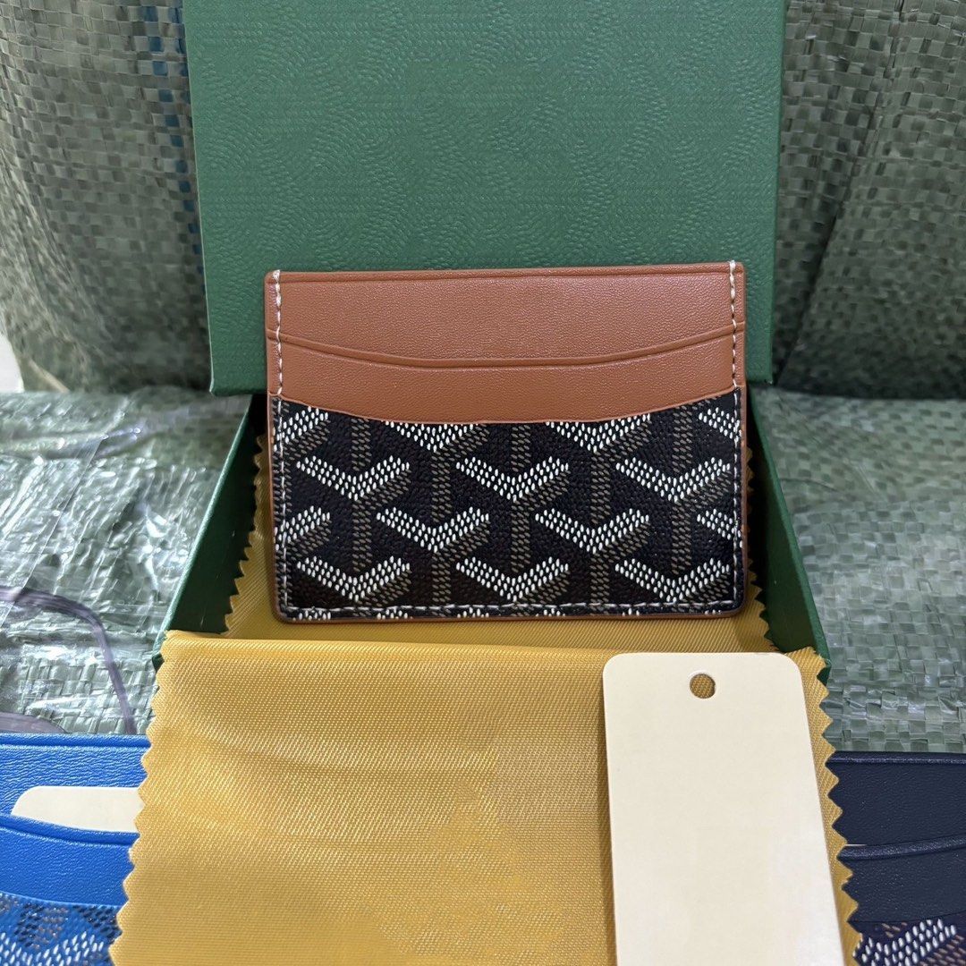 Goyard Card Holder - Multiple Colors Available (Category: Luxury Bags & Wallets) located in Manila. Submitted by adriyawnnn (Listing ID 1440544462, Image 3). Description: - Stylish card holder with iconic Goyard pattern. - Available colors: Green, Black, Brown, Red, Yellow. - Compact and practical for everyday essentials. - Keeps your cards neatly organized. - Comes with its original box..