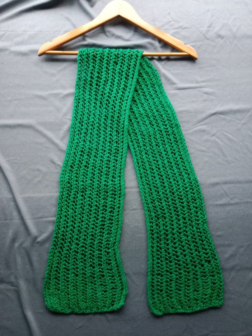 handmade dark green chunky knit scarf (Category: Scarves) located in Bontoc. Submitted by irene_banganan (Listing ID 1440573903, Image 1). Description: handmade dark green chunky knit scarf 7" wide x 56" long unique stitch, makapal very soft, excellent quality no flaws, in excellent condition.