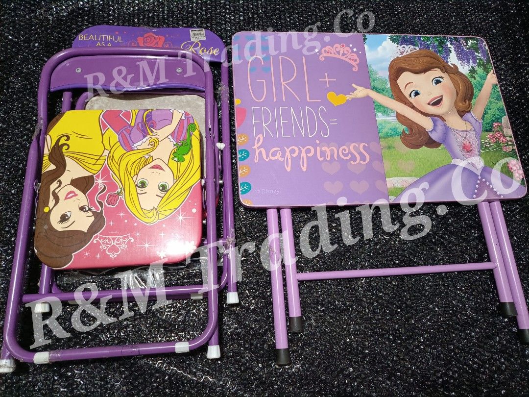 Hello Kitty Folding Table and Chair Set for Kids (Category: Kids Tables & Chairs) located in Pasig City. Submitted by artliam888 (Listing ID 1440575581, Image 3). Description: MALL PULL-OUT BRANDNEW AS-IS-WHERE-IS 1pc Table & 2pcs Chairs PRICE: 1,999 - Adorable Kitty folding table and chair set. - Perfect for drawing, playing, or eating. - Features a bright red frame with cute Kitty graphics and bows. - Folds flat for convenient storage. - Great 