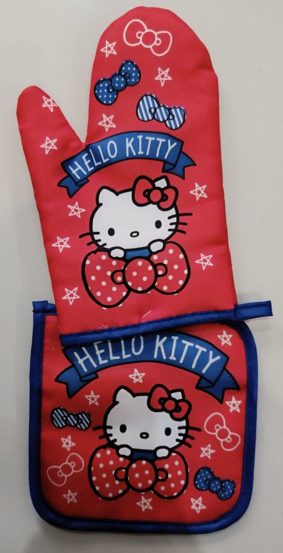 Hello Kitty Oven Mitt and Pot Holder Set (Category: Babies & Kids Fashion) located in Quezon City. Submitted by disco_10 (Listing ID 1440511463, Image 1). Description: - Adorable Kitty oven mitt and pot holder set. - Features a cute red design with white stars and blue bows. - Includes iconic Kitty graphics. - Essential for protecting your hands from hot cookware. - Ideal for everyday kitchen use. - Makes a wonderful gift for Kitty fans..