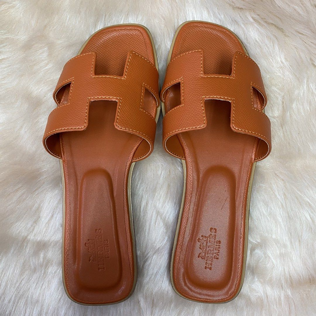 HERMES ORAN SANDAL (ORANGE) SIZE AVAILABLE (35-41) (Category: Flats & Sandals) located in San Juan City. Submitted by pattycollection113 (Listing ID 1440553516, Image 2). Description: HELLO WELCOME TO OUR SHOP our product is high quality and onhand. INCLUDES: BOX and PAPER BAG. AVAILABLE SIZE 35-41.