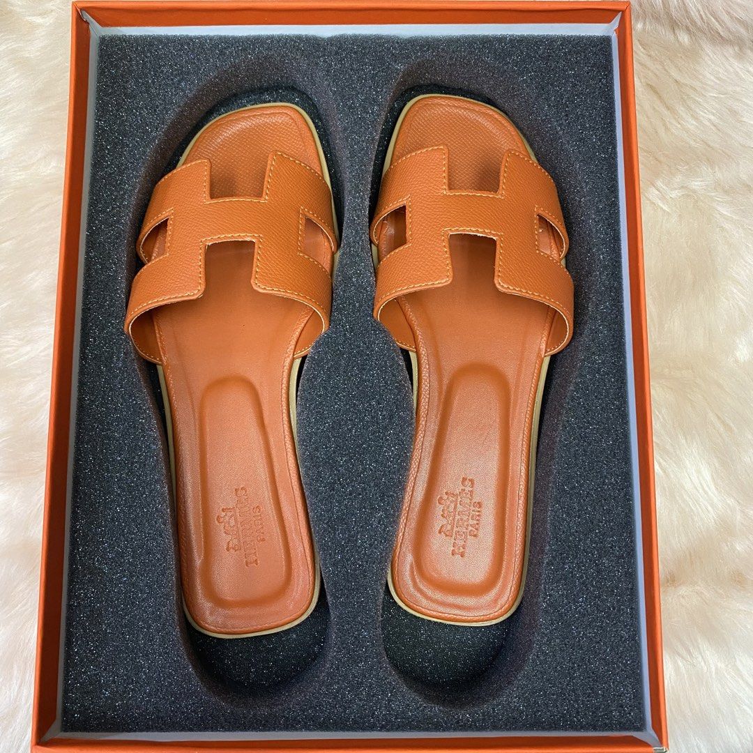 HERMES ORAN SANDAL (ORANGE) SIZE AVAILABLE (35-41) (Category: Flats & Sandals) located in San Juan City. Submitted by pattycollection113 (Listing ID 1440553516, Image 1). Description: HELLO WELCOME TO OUR SHOP our product is high quality and onhand. INCLUDES: BOX and PAPER BAG. AVAILABLE SIZE 35-41.