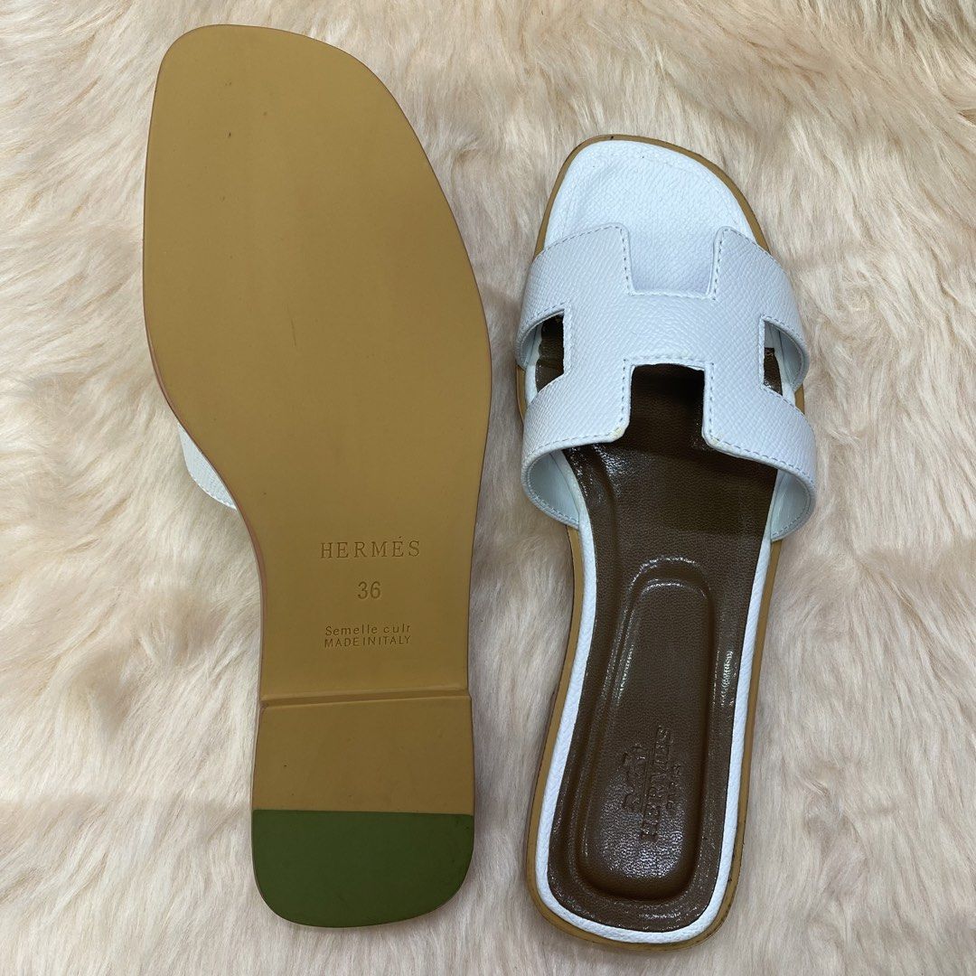 HERMES ORAN SLIPPER (WHITE) SIZE AVAILABLE (35-41) (Category: Slippers & Slides) located in San Juan City. Submitted by pattycollection113 (Listing ID 1440553052, Image 3). Description: HELLO WELCOME TO OUR SHOP our product is high quality and onhand. INCLUDES: BOX and PAPER BAG. AVAILABLE SIZE 35-41.