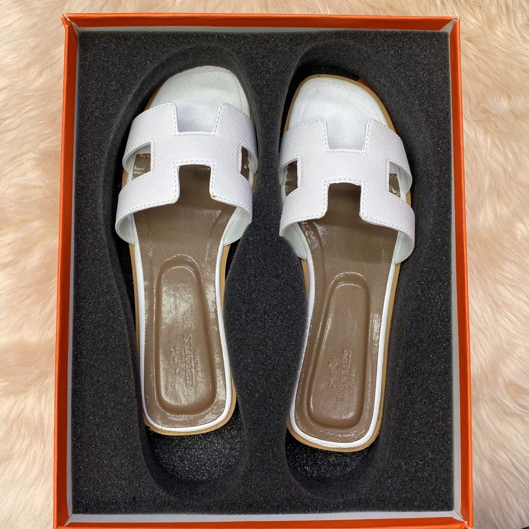 HERMES ORAN SLIPPER (WHITE) SIZE AVAILABLE (35-41) (Category: Slippers & Slides) located in San Juan City. Submitted by pattycollection113 (Listing ID 1440553052, Image 1). Description: HELLO WELCOME TO OUR SHOP our product is high quality and onhand. INCLUDES: BOX and PAPER BAG. AVAILABLE SIZE 35-41.