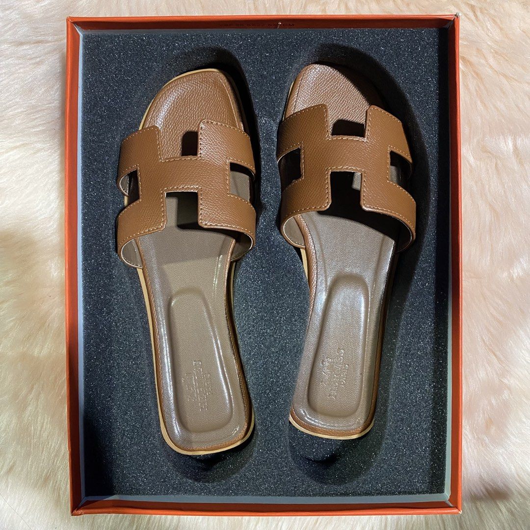 HERMES ORAN SLIPPER (TAN) SIZE AVAILABLE (35-41) (Category: Flats & Sandals) located in San Juan City. Submitted by pattycollection113 (Listing ID 1440554627, Image 1). Description: HELLO WELCOME TO OUR SHOP our product is high quality and onhand. INCLUDES: BOX and PAPER BAG. AVAILABLE SIZE 35-41.