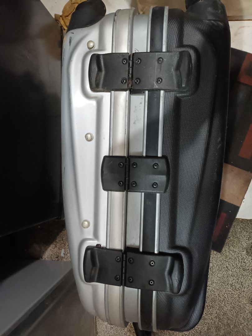 Inported Travel Luggage (Category: Luggage) located in Pasig City. Submitted by mhalen21 (Listing ID 1440409025, Image 2). Description: - Silver and black hard shell rolling suitcase - Retractable handle and wheels for easy transport - Interior features straps and zippered compartments - Some scuffs on exterior from normal use - Comes with a key - Perfect for your next adventure!.