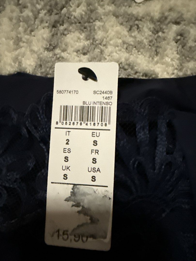 Intimissimi Navy Lace Bra and Panty Set (Category: Undergarments & Loungewear) located in Cavite. Submitted by rcmontoya (Listing ID 1440466983, Image 2). Description: - Brand: Intimissimi - Color: Navy Blue - Set includes: Balconette bra and high-waisted panties - Features: Intricate lace detailing on bra cups and panty front - Bra style: Balconette with adjustable straps - Panty style: High-waisted, comfortable fit - Condition: Brand new with t