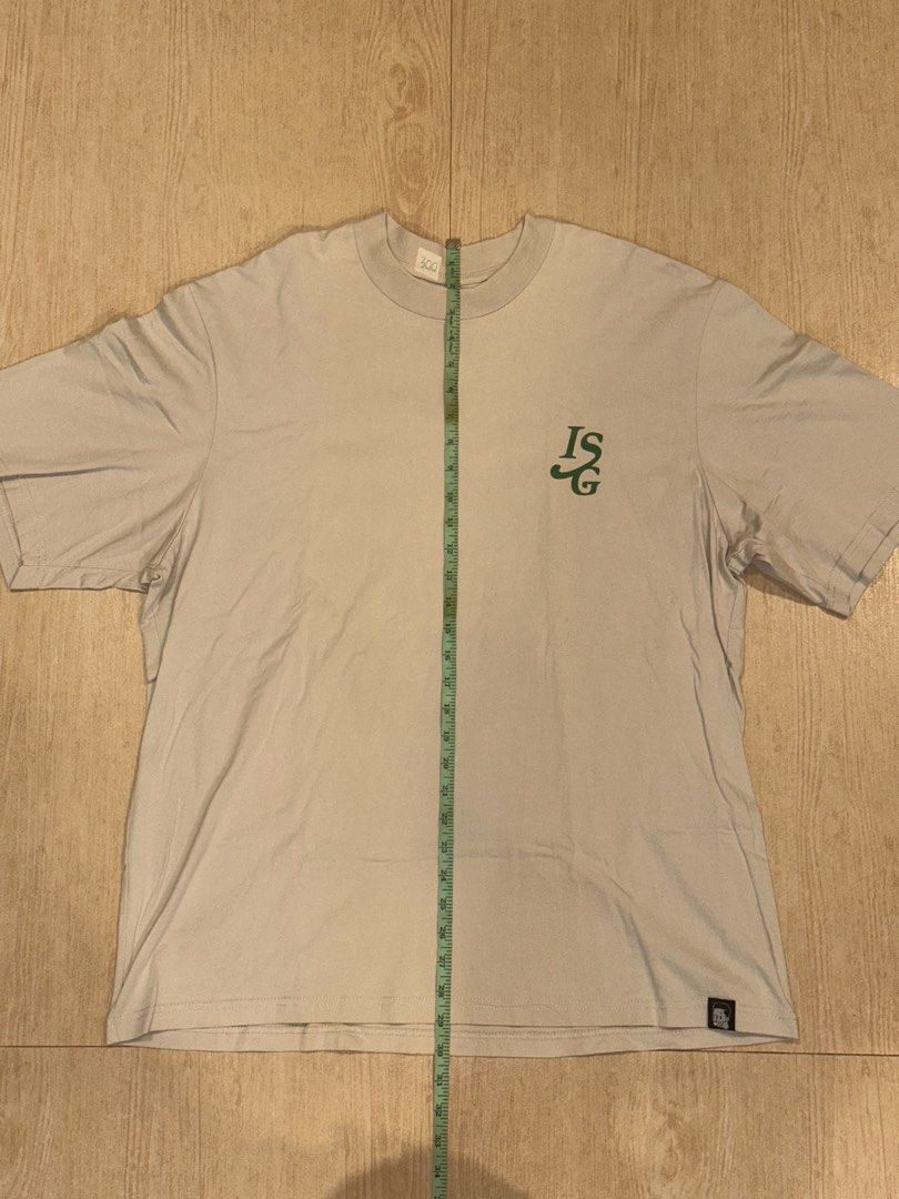ISG Fresh Picks Graphic T-Shirt (Category: Tshirts & Polo Shirts ) located in Santa Rosa. Submitted by ltvelasco (Listing ID 1440458922, Image 2). Description: - Eye-catching 'Fresh Picks' graphic tee - Features a cool cartoon character and sneakers design on the back - 'ISG' logo detail on the front left chest - Measurements: Length 76cm, Width 60cm (fits like a Large) - Ideal for everyday casual wear.