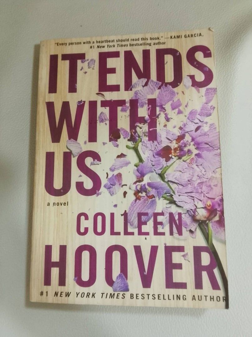 It Ends With Us by Colleen Hoover (Category: Storybooks) located in Manila. Submitted by sysphy (Listing ID 1440572789, Image 1). Description: Ends With Us by Colleen Hoover. Emotional read from a #1 NYT bestselling author. Features a wooden cover with purple floral details. with dents and sign of storage loc: national university manila mod: meet up (+sf), lalamove meet up places: ust, adamson, la salle, nu manila/moa, lrt 1 & 2 stations, moa, mo
