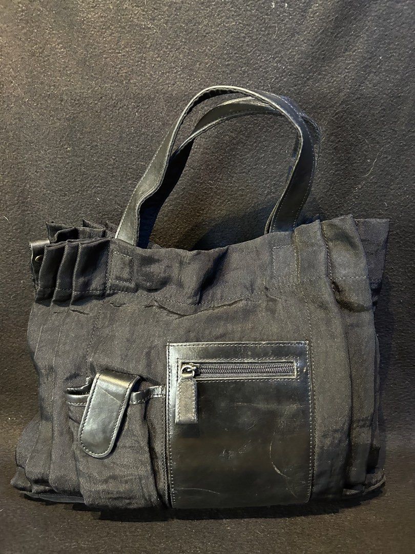 Japan black nylon bag, unique bag (Category: Luxury Bags & Wallets) located in Quezon City. Submitted by WIMC2ndaccount (Listing ID 1440562600, Image 2). Description: - original - nylon - 35- 27 Centimeters -vintage -rare - preloved -manage your expectations vintagge item - normal sign of usssge, -bag is in good condition .