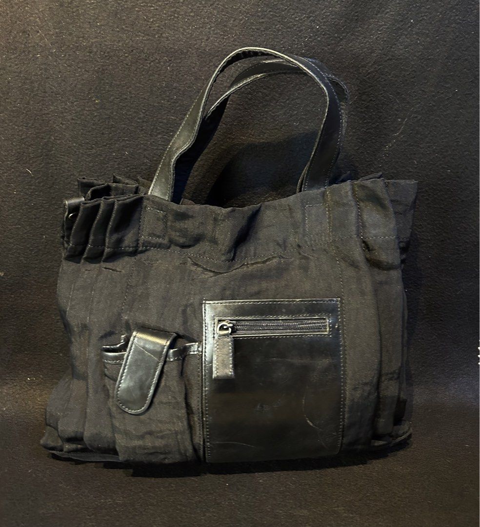 Japan black nylon bag, unique bag (Category: Luxury Bags & Wallets) located in Quezon City. Submitted by WIMC2ndaccount (Listing ID 1440562600, Image 1). Description: - original - nylon - 35- 27 Centimeters -vintage -rare - preloved -manage your expectations vintagge item - normal sign of usssge, -bag is in good condition .