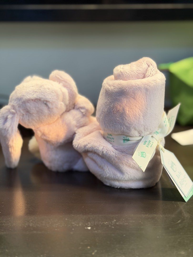 Jellycat Bunny Plush Toy Pink (Category: Plushies & Soft Toys) located in Quezon City. Submitted by lokasm (Listing ID 1440476706, Image 1). Description: - Super soft Jellycat bunny plush - Lovely pastel pink color - Bunny is rolled up and tied with a cute ribbon - Comes with original tags - Very huggable and cuddly - Great gift for a baby or toddler Never been used. Bought in Japan. I also have receipt for proof of purchase. RFS: bought the wron