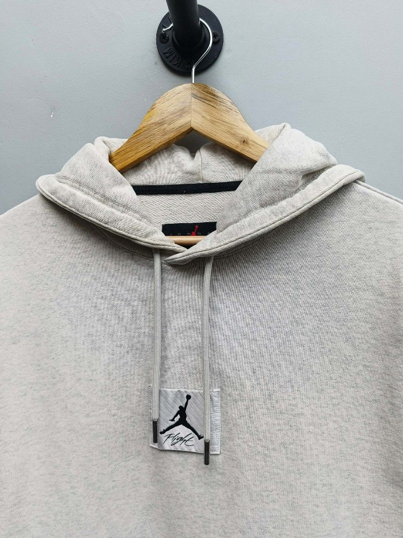 Jordan Flight Essentials Hoodie Light Grey Size L (Category: Coats, Jackets and Outerwear) located in Taguig. Submitted by _theroom.ph (Listing ID 1440485217, Image 3). Description: - Light grey marl Jordan hoodie - Features the iconic Jumpman logo on the chest - Made from a comfortable cotton blend - Perfect for everyday casual wear - Size: Large (L) - Check tags for specific material composition Jordan Flight Essential Hoodie Size Large 27.5 x 