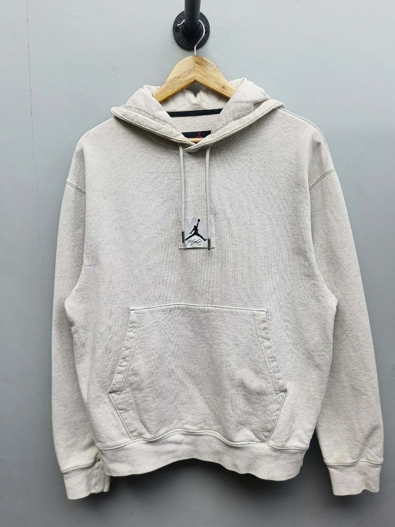 Jordan Flight Essentials Hoodie Light Grey Size L (Category: Coats, Jackets and Outerwear) located in Taguig. Submitted by _theroom.ph (Listing ID 1440485217, Image 2). Description: - Light grey marl Jordan hoodie - Features the iconic Jumpman logo on the chest - Made from a comfortable cotton blend - Perfect for everyday casual wear - Size: Large (L) - Check tags for specific material composition Jordan Flight Essential Hoodie Size Large 27.5 x 