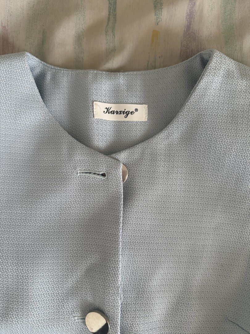 Karsige Light Blue Cropped Blazer with Silver Buttons (Category: Coats, Jackets and Outerwear) located in Paranaque City. Submitted by declutterwyae (Listing ID 1440437611, Image 3). Description: - Light blue cropped blazer from Karsige - Short sleeves - Three large silver buttons down the front - Round neckline - Textured fabric - Pairs well with high-waisted bottoms.