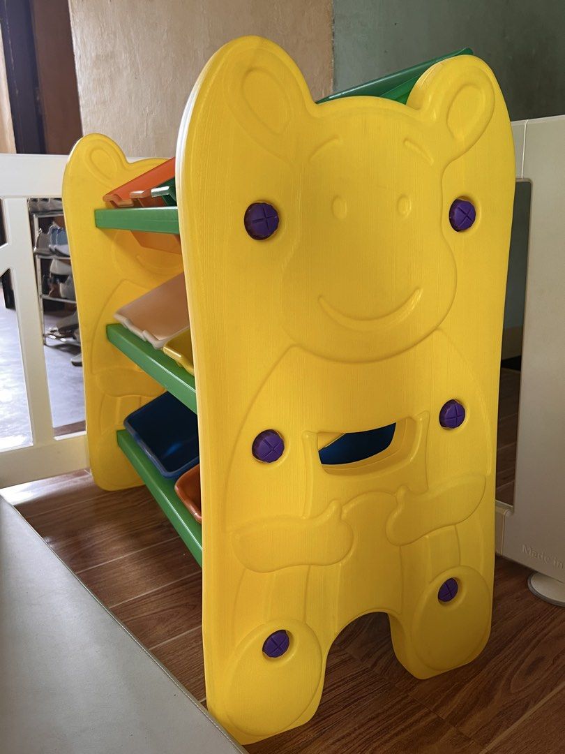 Kids Toy Storage Organizer with Bins (Category: Storage Boxes & Baskets) located in Angono. Submitted by elyenitty_ (Listing ID 1440425751, Image 2). Description: - Brightly colored toy organizer perfect for kids' rooms. - Features multiple bins in various sizes and colors. - Keeps toys tidy and easily accessible for little ones. - Sturdy plastic construction for durability. - Helps declutter play areas and makes tidying up fun..
