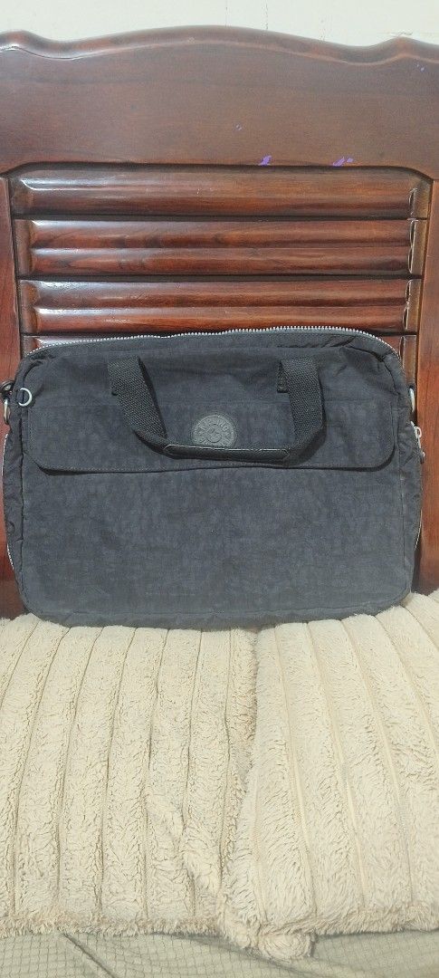 Kipling Laptop Bag BLACK (Category: Laptop Bags & Sleeves) located in Caloocan City. Submitted by thrift2trend (Listing ID 1440452439, Image 1). Description: - Black Kipling laptop bag - Top handles and detachable shoulder strap - Multiple internal compartments for organization - Secure zip-up closure - Durable material - Ideal for work or travel missing monkey. .